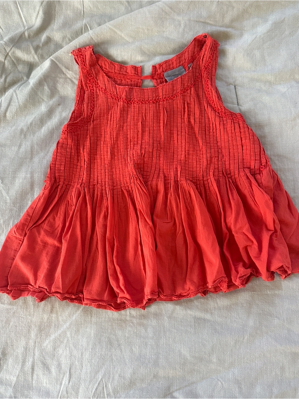 Anthropologie Orange Sleeveless Smocked Peplum Top